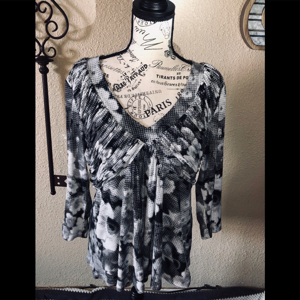 Woman’s Calvin Klein three quarter sleeve blouse